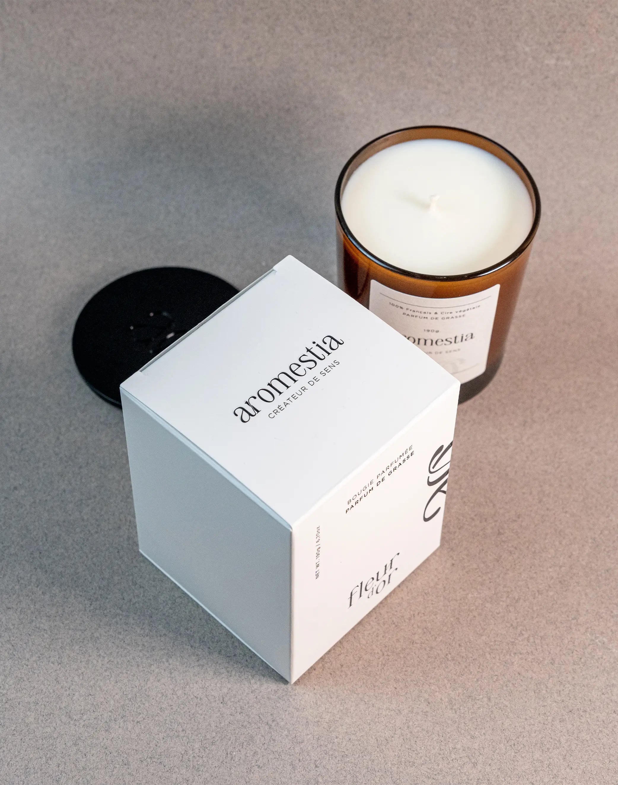 Vue de haut bougie fleur d'or Aromestia