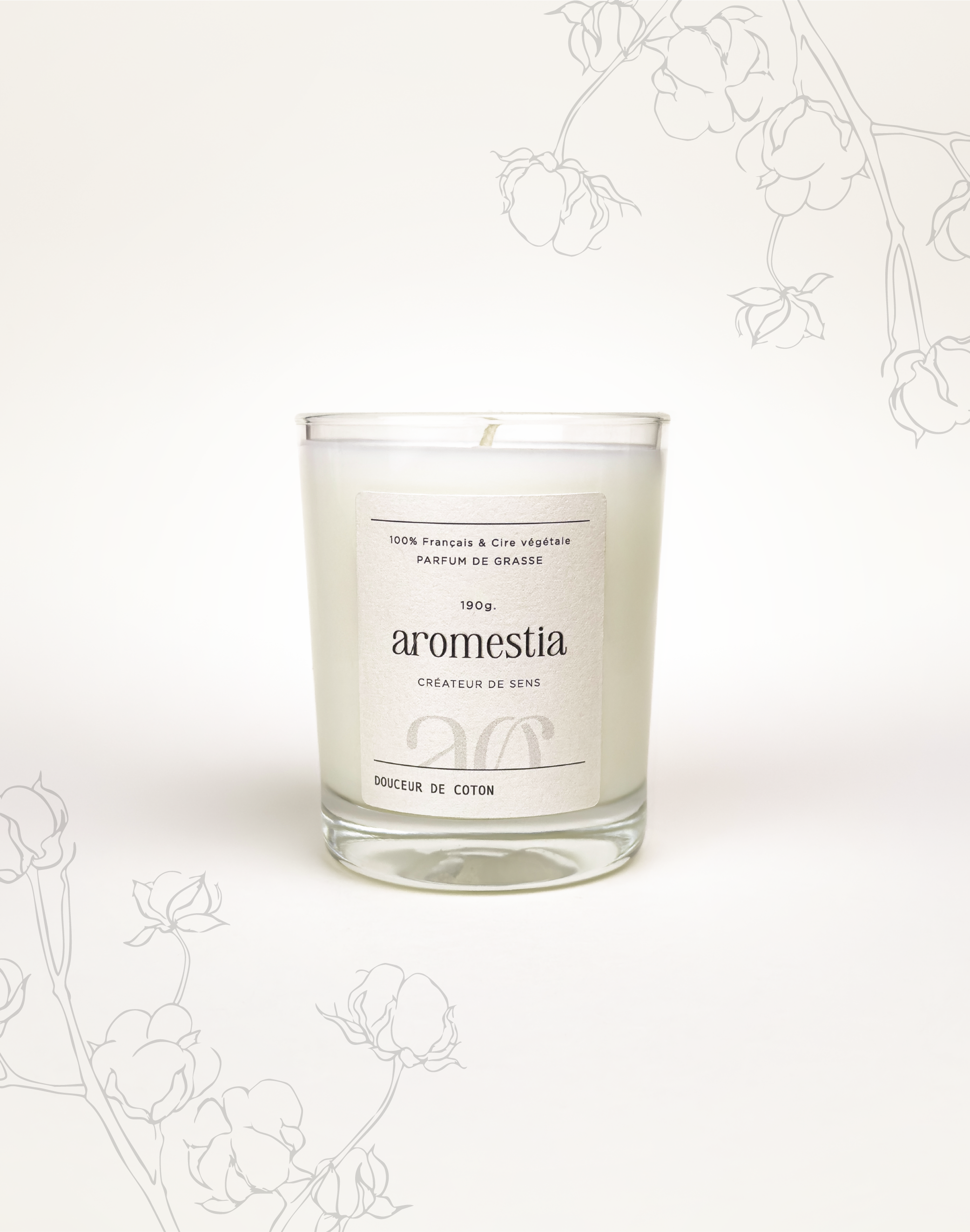 Présentation de la bougie fleur de coton Aromestia avec un contenant transparent